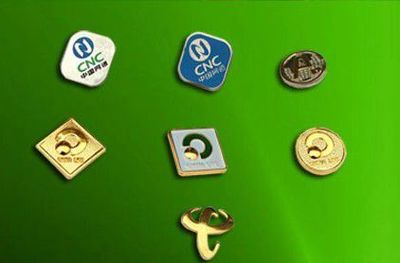 鏤空胸章,北京西服微章工廠直銷企業VI徽章佩戴在胸口上.